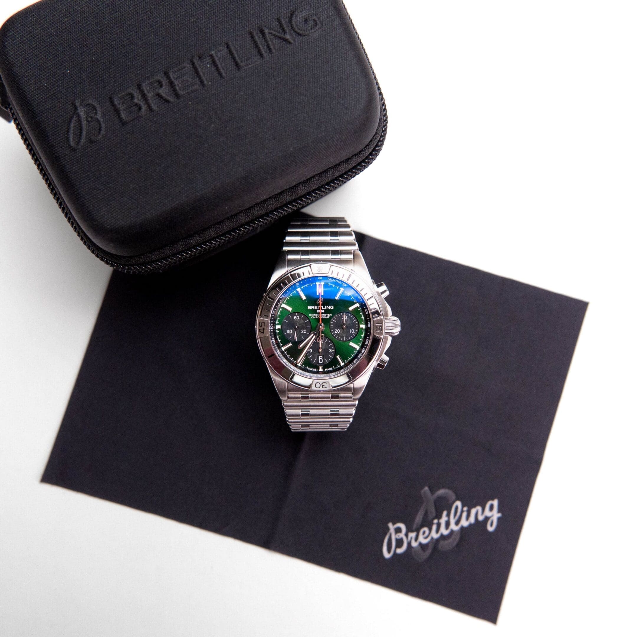 Luxury Breitling watch with branded case.
