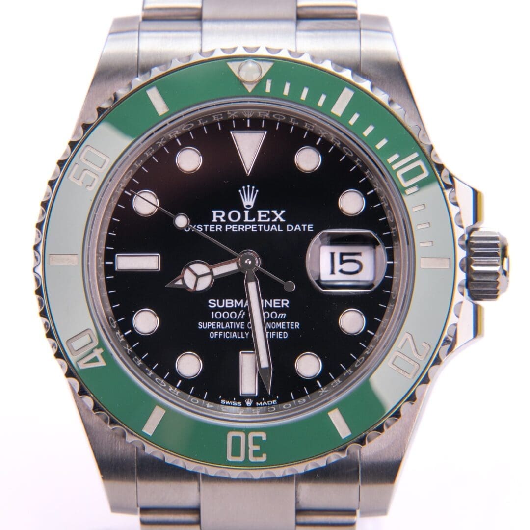 Luxury watch with green and black design.