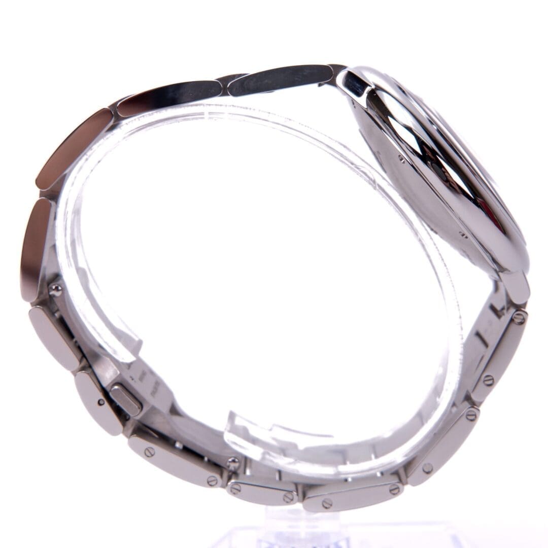 Silver wristwatch with metal bracelet side view.
