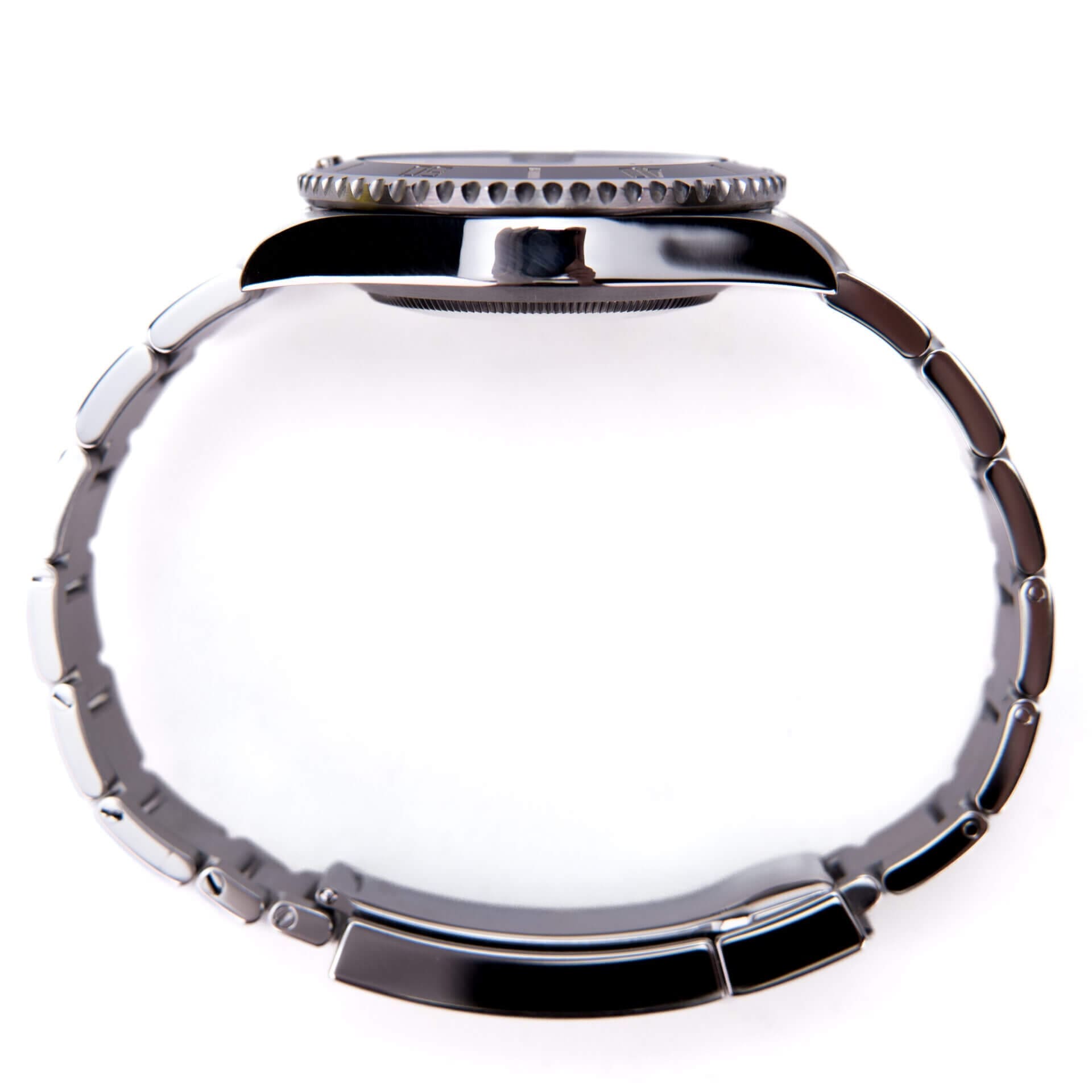 Side view of a metal wristwatch.