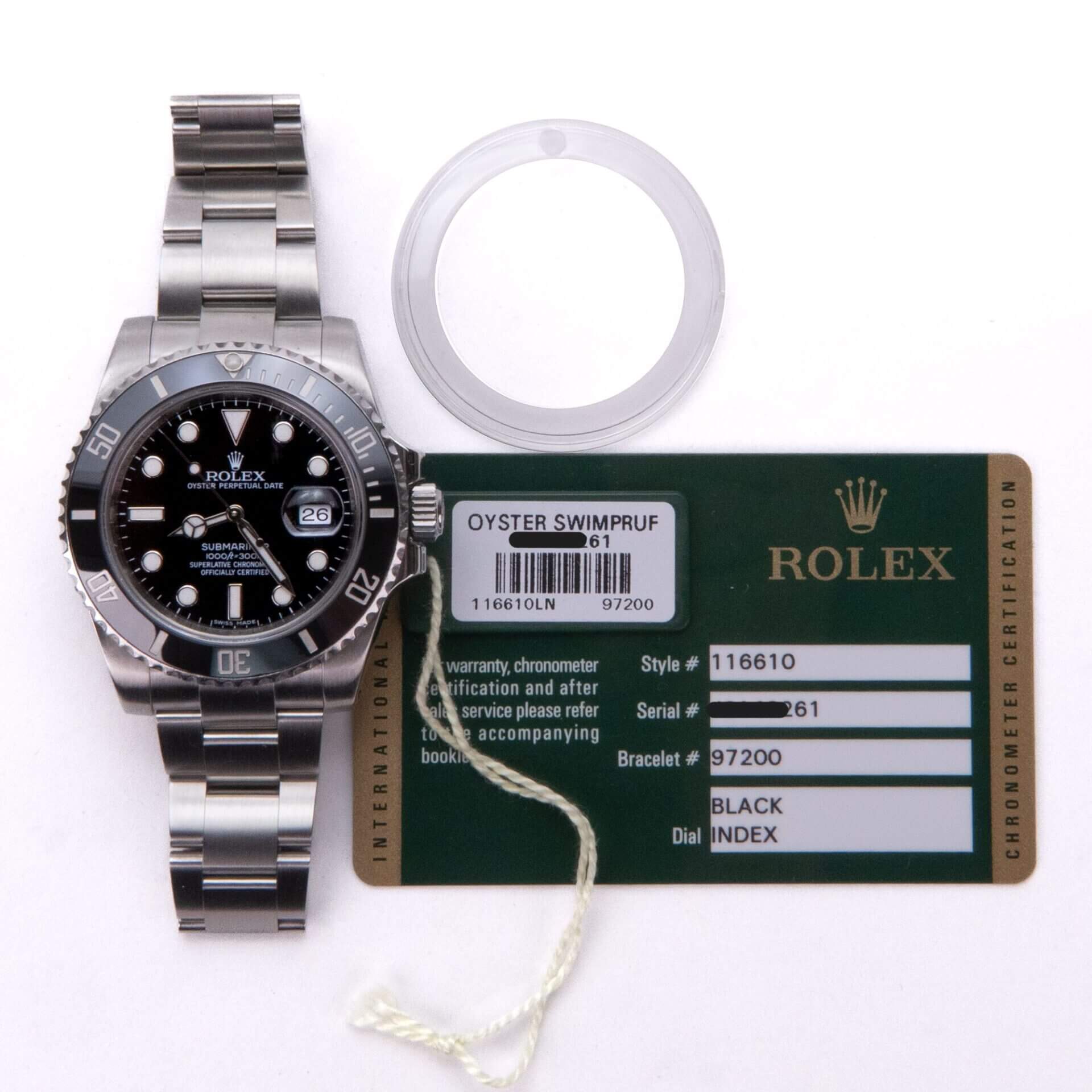 Stainless steel watch with certification card.