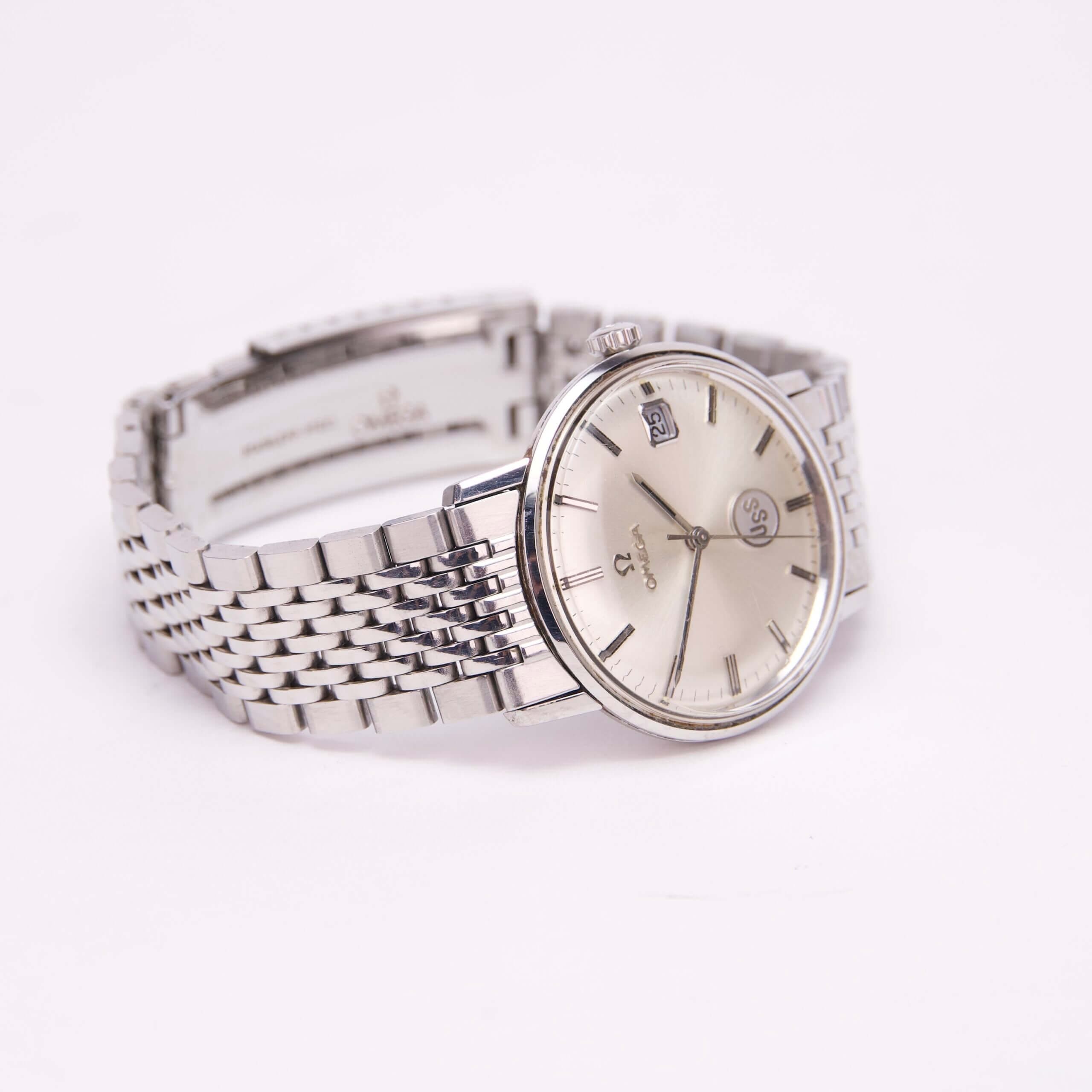 Silver wristwatch with metal link bracelet.