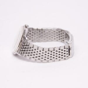 Silver wristwatch with metal link band.