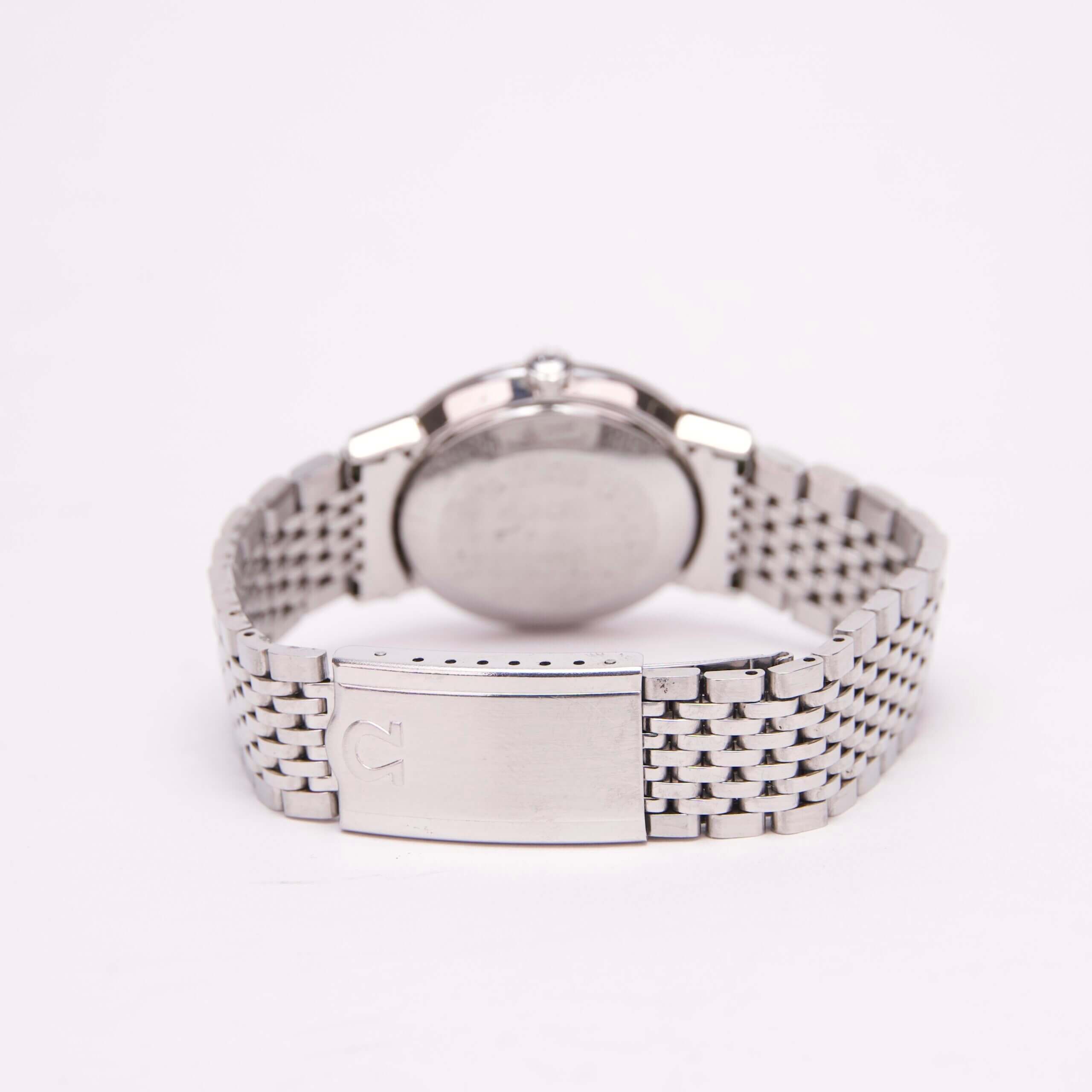 Silver watch with a metal bracelet.