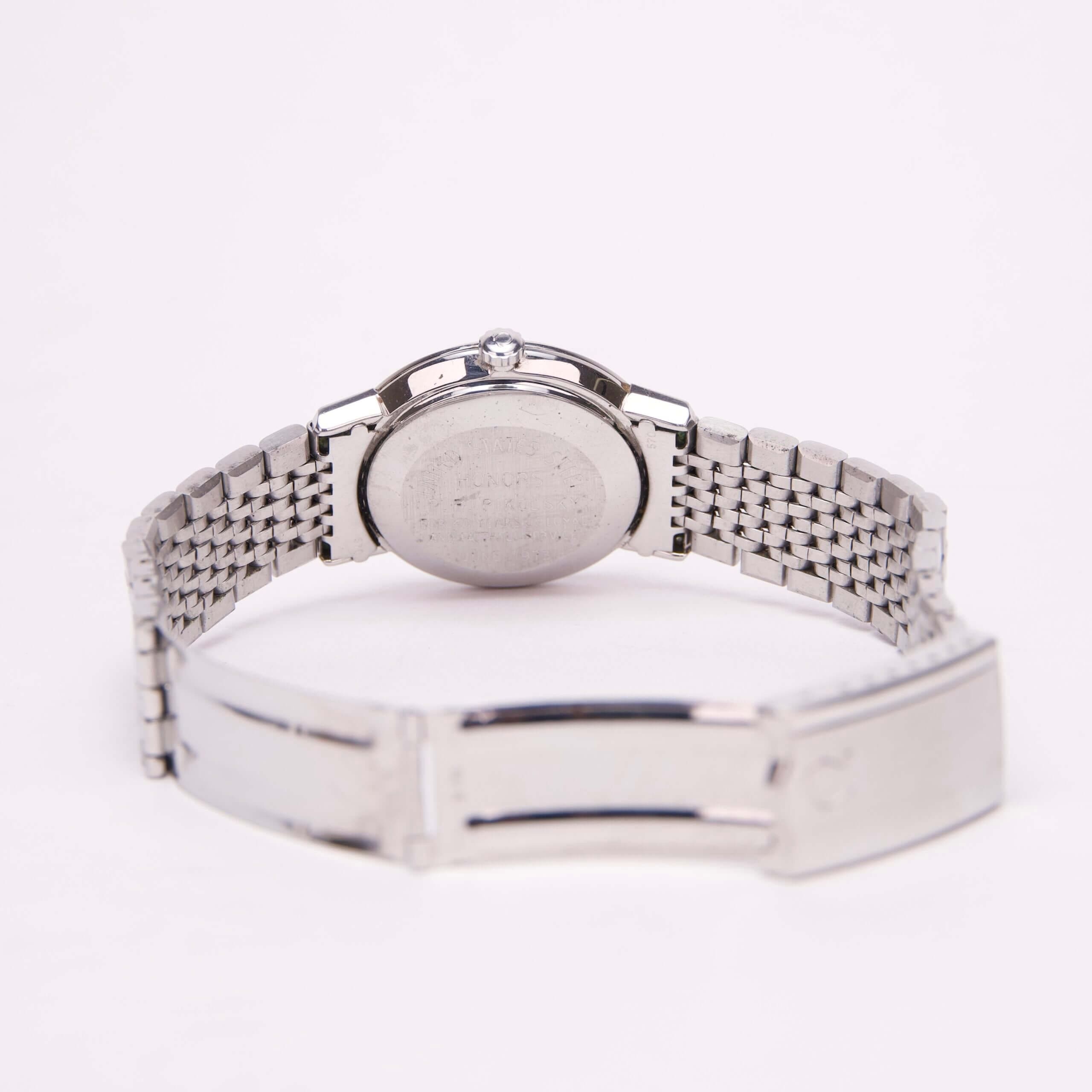Silver wristwatch with metal bracelet band.