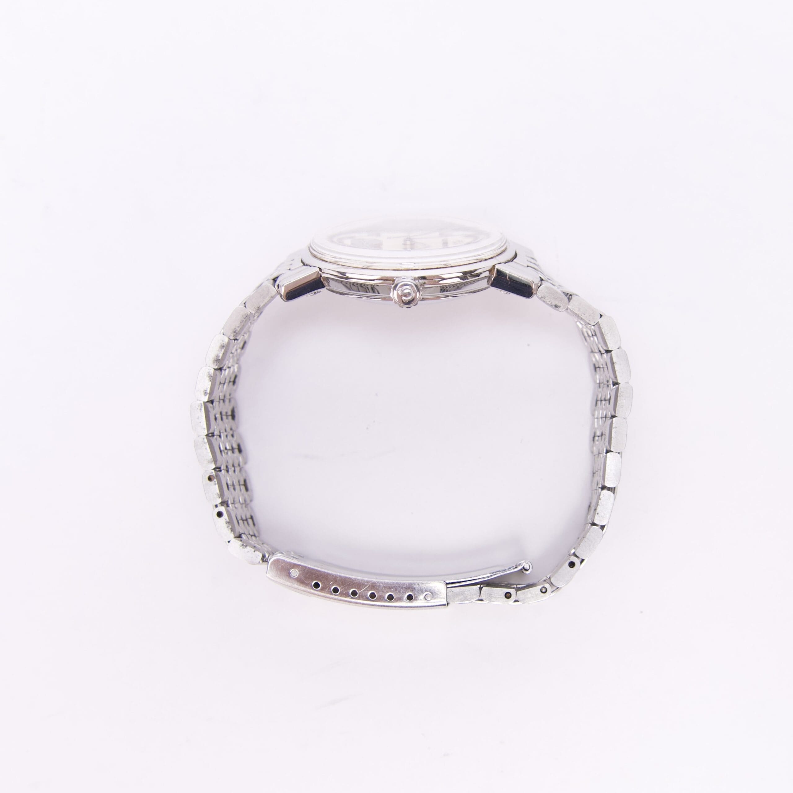 Silver wristwatch with metal bracelet.