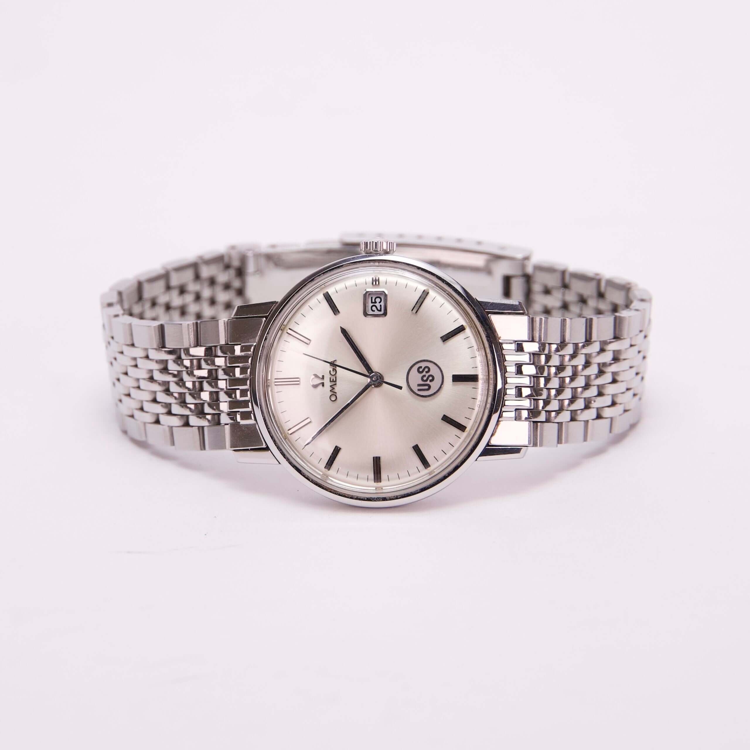 Silver wristwatch with metal link band.
