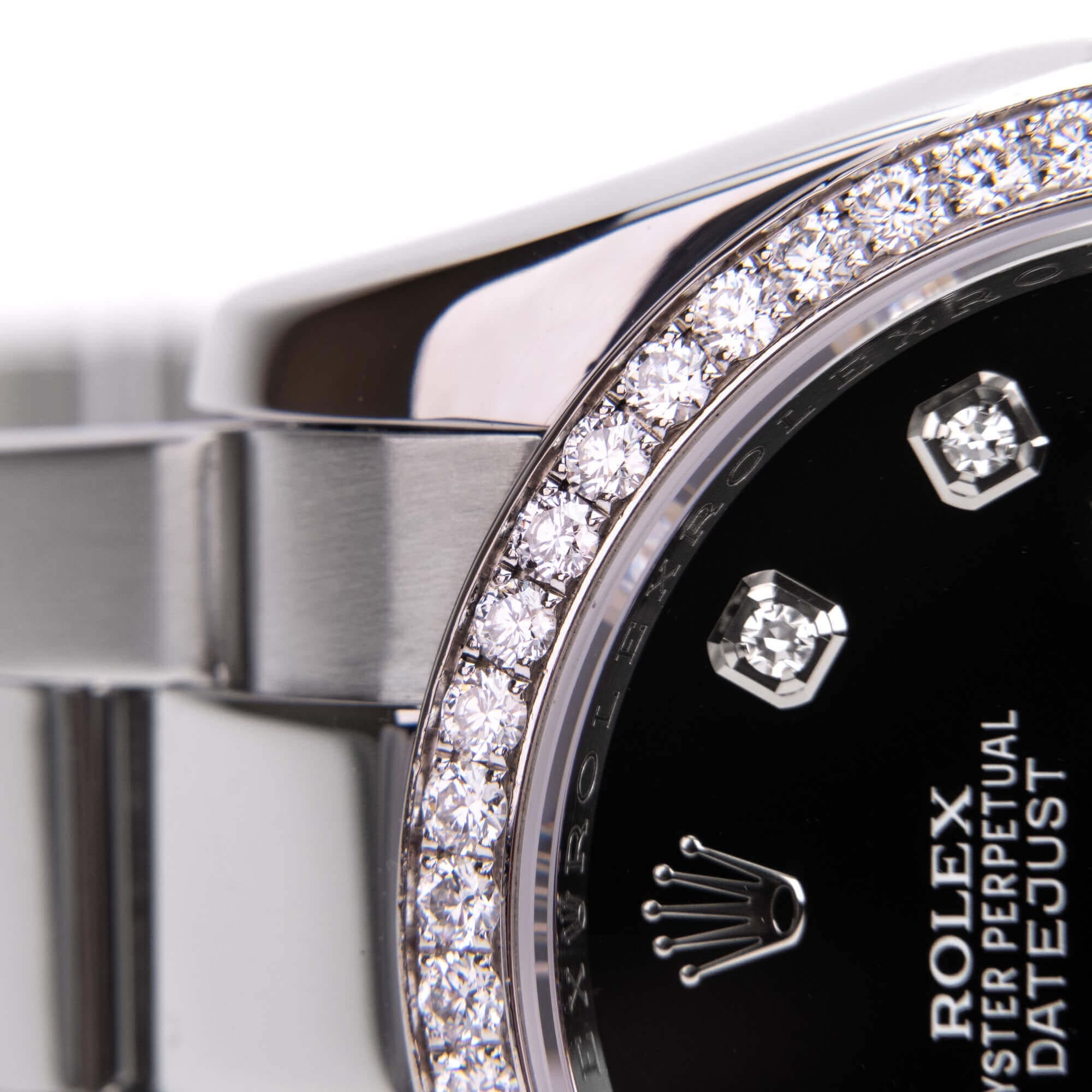 Luxury watch with diamond-encrusted bezel.