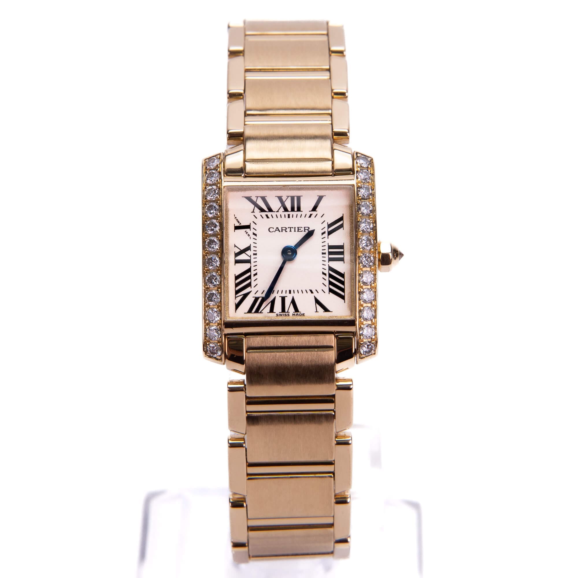 Gold wristwatch with diamond accents and Roman numerals.