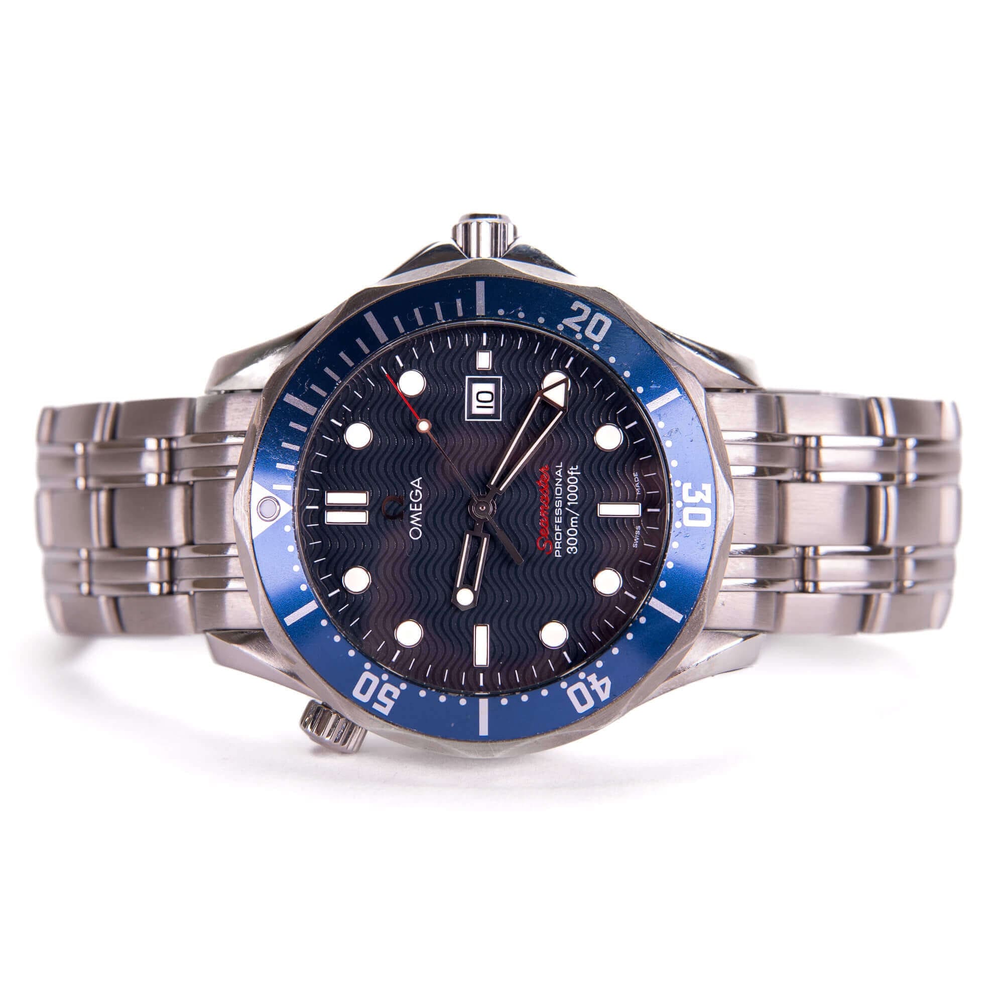 Silver wristwatch with blue bezel and dial.
