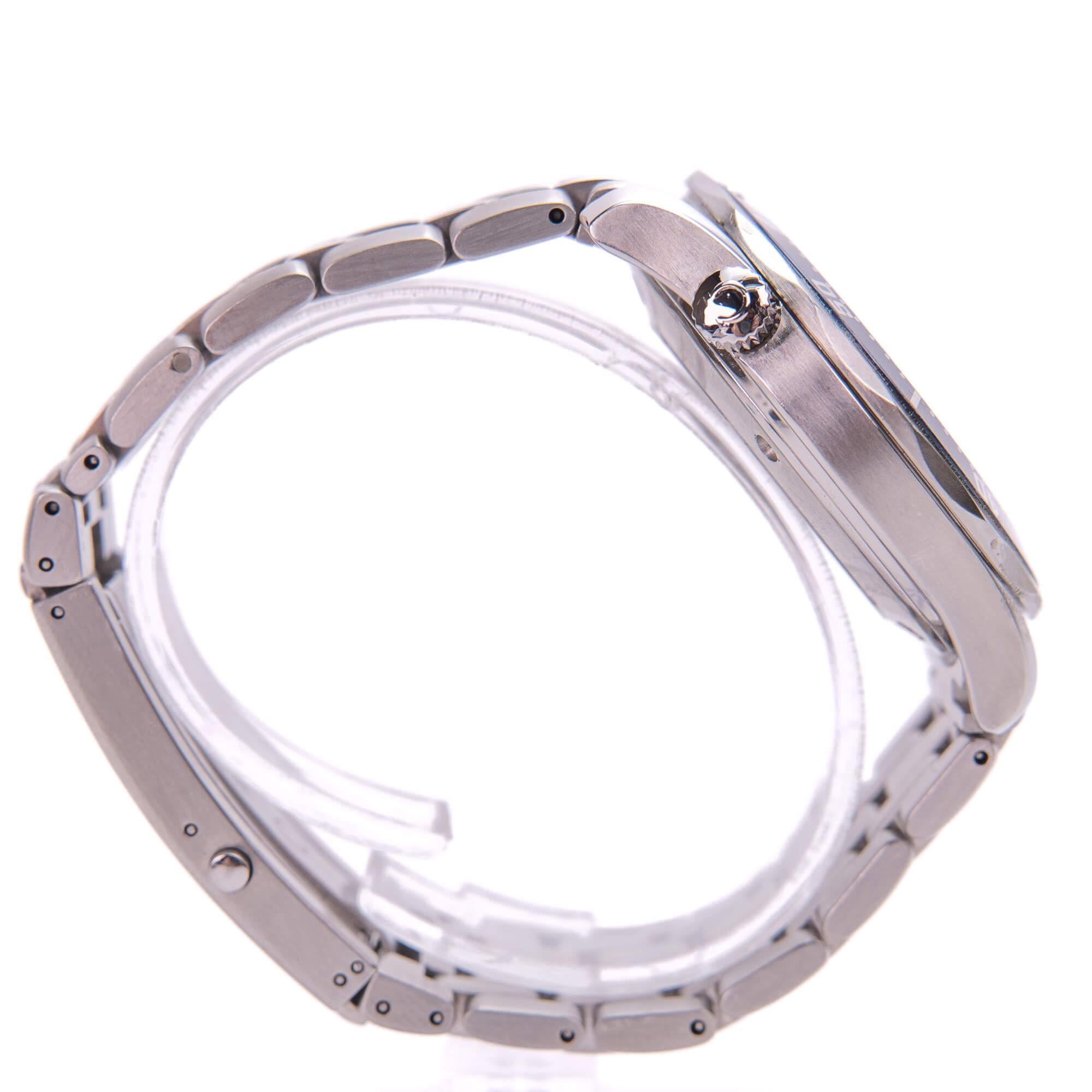Silver wristwatch with metal bracelet, side view.