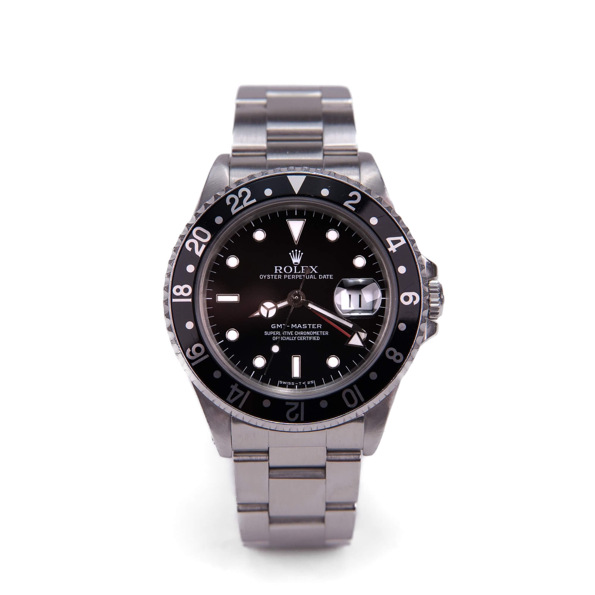 Luxury stainless steel watch with black dial.