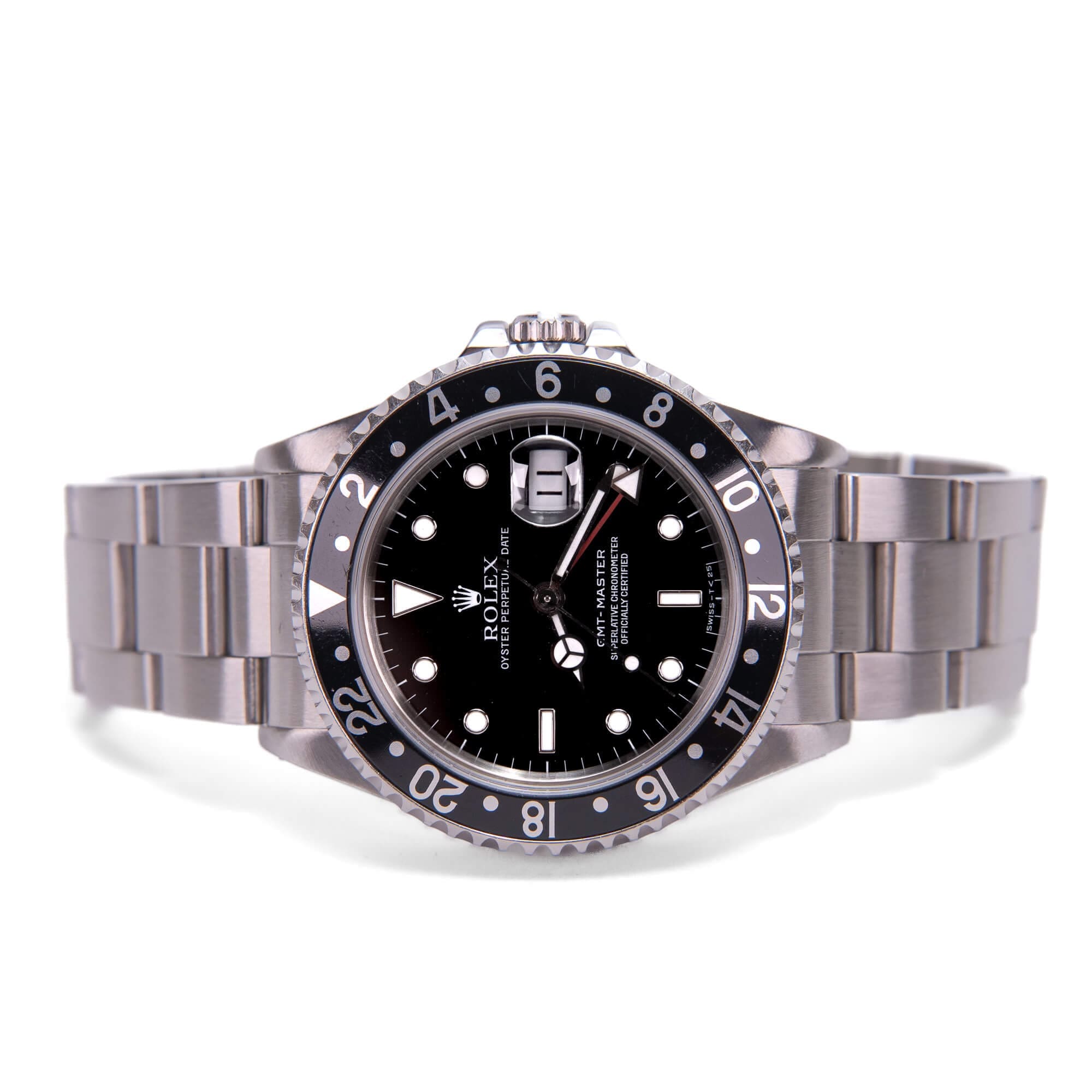 Luxury stainless steel watch with black dial.