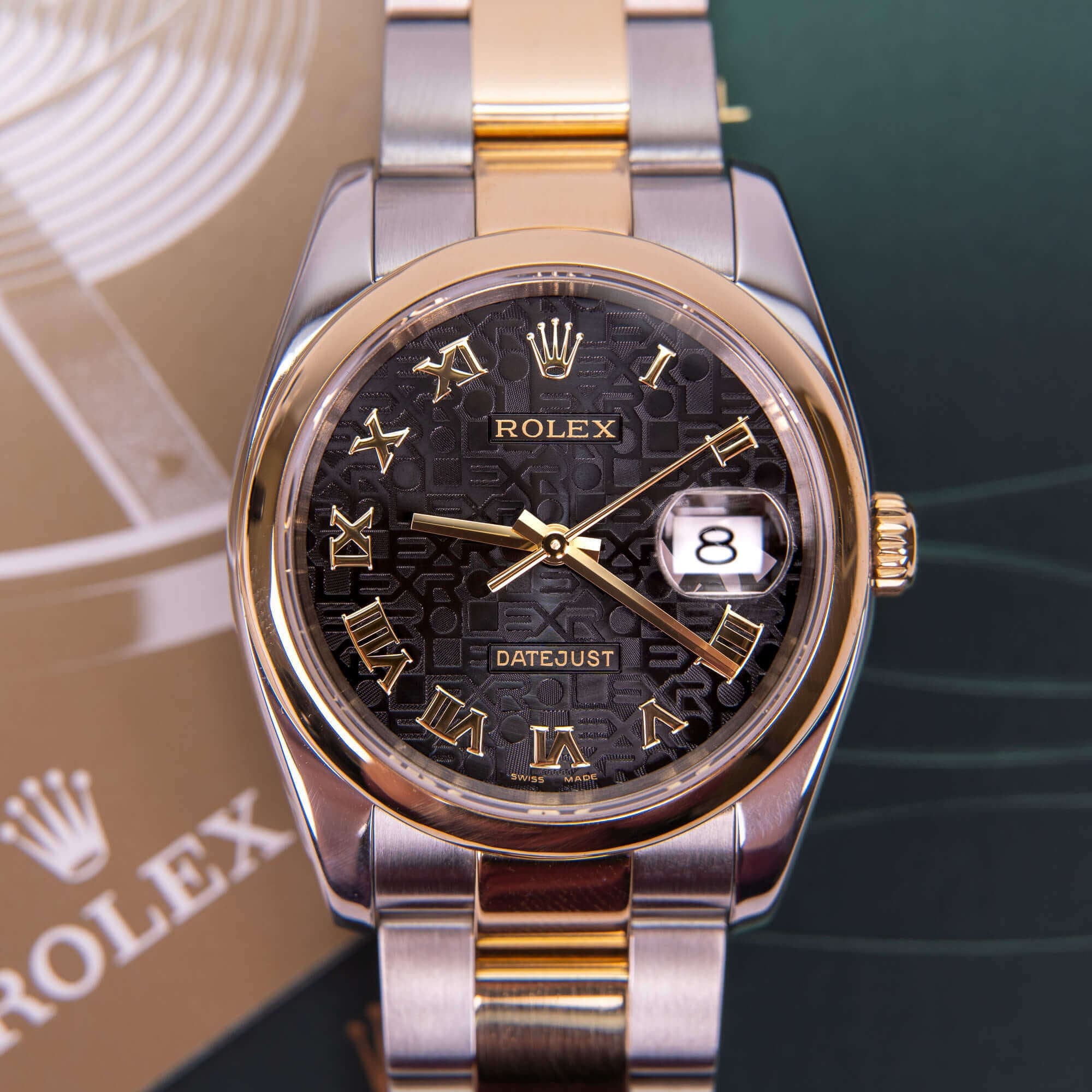 Luxury Rolex watch with Roman numerals.
