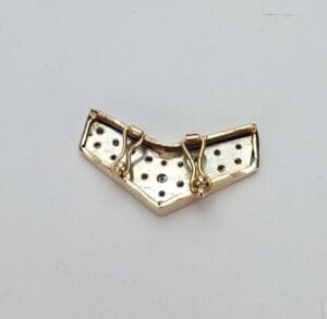 Gold and silver decorative jewelry clasp.