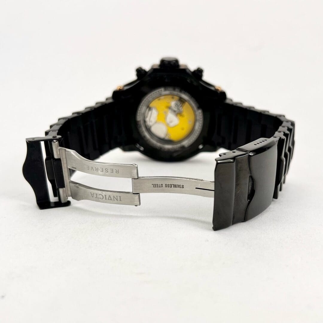 Black Invicta watch with stainless steel clasp.