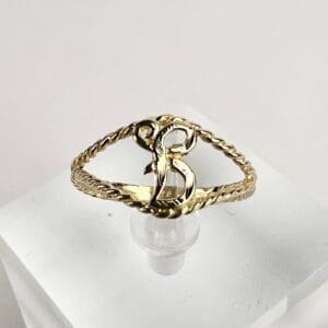 Gold twisted ring with letter "B".